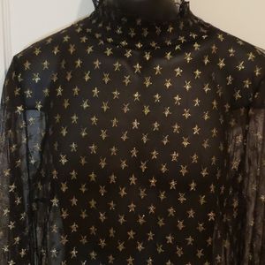 Lane Bryant black top with gold stars